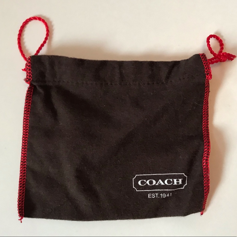 Brown Coach dust bag with red details